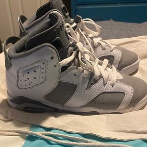 Big Kids grey and white Retro Jordan 6, size 5Y/6.5W
